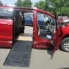 Red Chrysler Pacifica with BraunAbility Side Entry Automatic Fold Out conversion