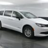 White Chrysler Voyager with BraunAbility Rear Entry Manual Fold Out conversion