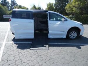 White Chrysler Pacifica with BraunAbility Side Entry Automatic In Floor conversion