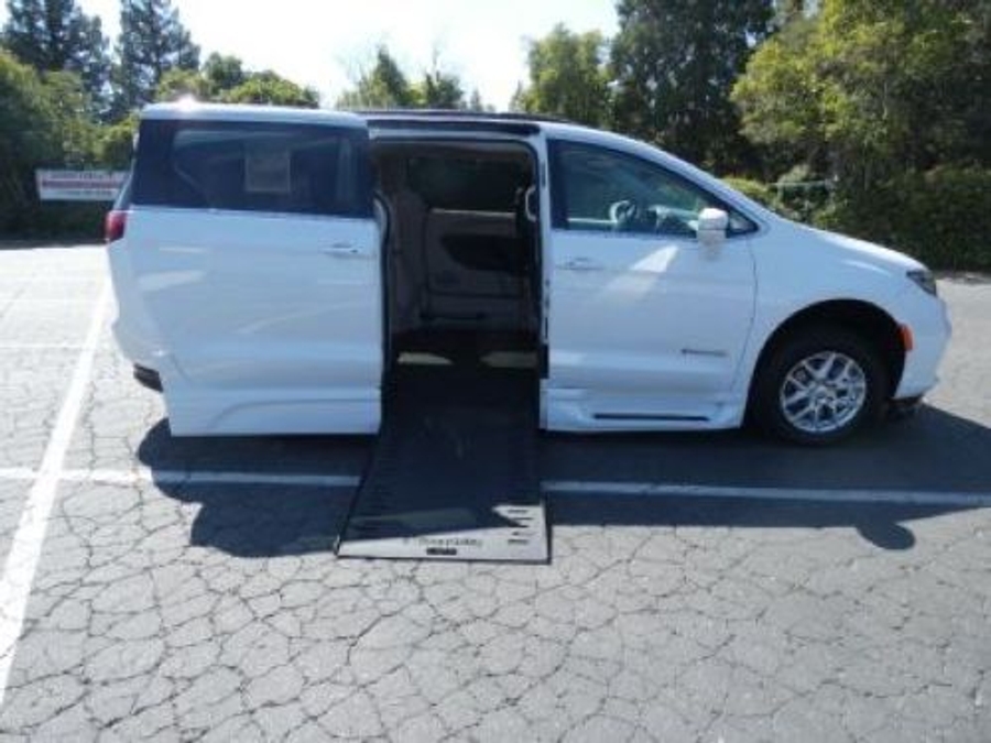 White Chrysler Pacifica with BraunAbility Side Entry Automatic In Floor conversion