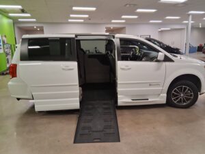 White Dodge Grand Caravan with BraunAbility Side Entry Automatic Fold Out conversion