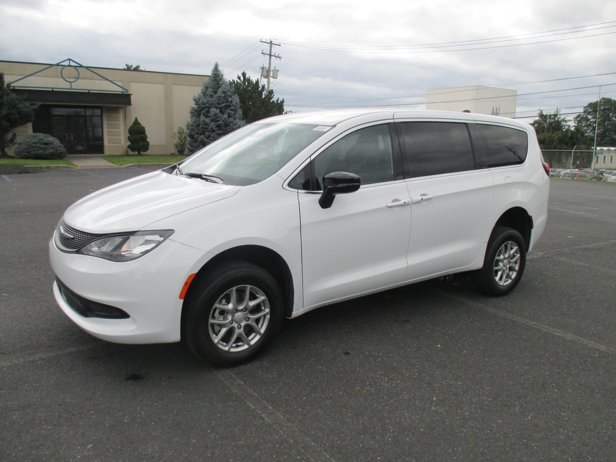 White Chrysler Pacifica with FR Conversions Rear Entry Manual Fold Out conversion