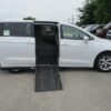 White Chrysler Pacifica with Adaptive Vans Side Entry Automatic Fold Out conversion