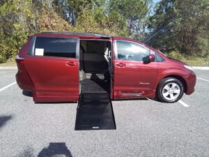 Red Toyota Sienna with BraunAbility Side Entry Automatic Fold Out conversion