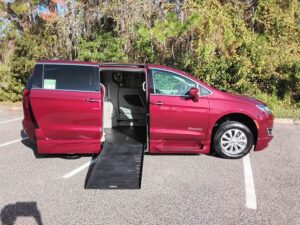 Red Chrysler Pacifica with BraunAbility Side Entry Automatic Fold Out conversion