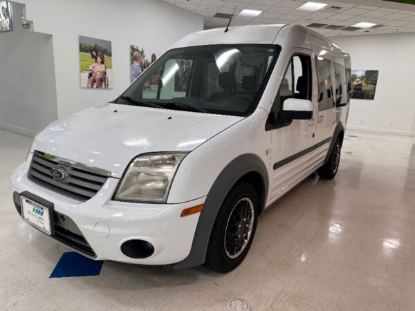 White Ford Transit Connect with Driverge Rear Entry Manual Fold Out conversion
