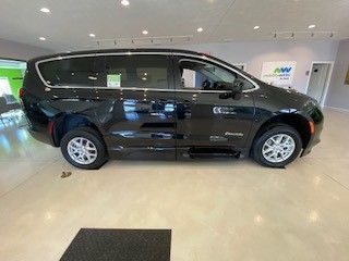 Black Chrysler Voyager with BraunAbility Side Entry Automatic Fold Out conversion