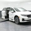 White Honda Odyssey with BraunAbility Side Entry Automatic In Floor conversion