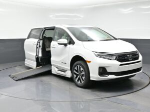 White Honda Odyssey with BraunAbility Side Entry Automatic In Floor conversion