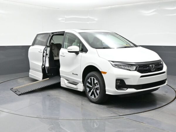 White Honda Odyssey with BraunAbility Side Entry Automatic In Floor conversion