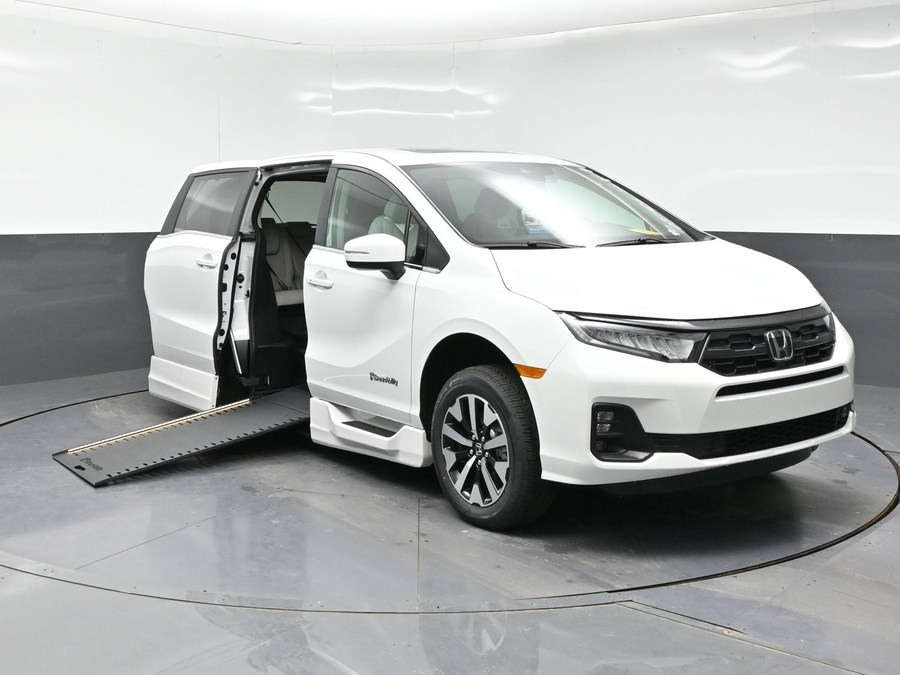 White Honda Odyssey with BraunAbility Side Entry Automatic In Floor conversion
