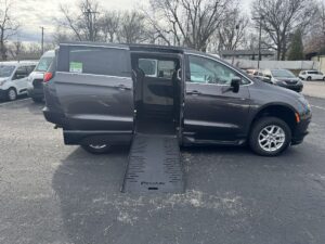 Grey Chrysler Voyager with BraunAbility Side Entry Manual Fold Out conversion