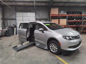 Silver Chrysler Voyager with BraunAbility Side Entry Automatic Fold Out conversion