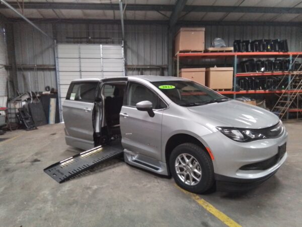 Silver Chrysler Voyager with BraunAbility Side Entry Automatic Fold Out conversion