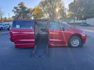 Red Chrysler Pacifica with BraunAbility Side Entry Automatic Fold Out conversion