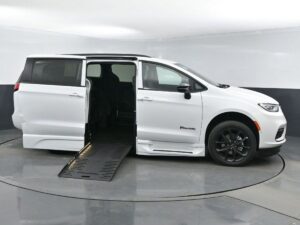 White Chrysler Pacifica with BraunAbility Side Entry Automatic Fold Out conversion
