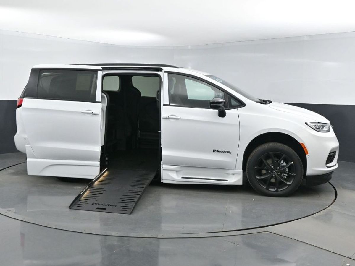 White Chrysler Pacifica with BraunAbility Side Entry Automatic Fold Out conversion