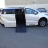 White Toyota Sienna with BraunAbility Side Entry Automatic Fold Out conversion