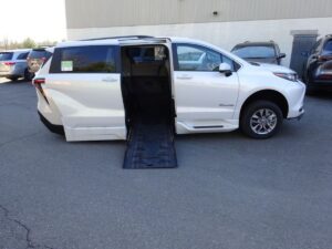 White Toyota Sienna with BraunAbility Side Entry Automatic Fold Out conversion