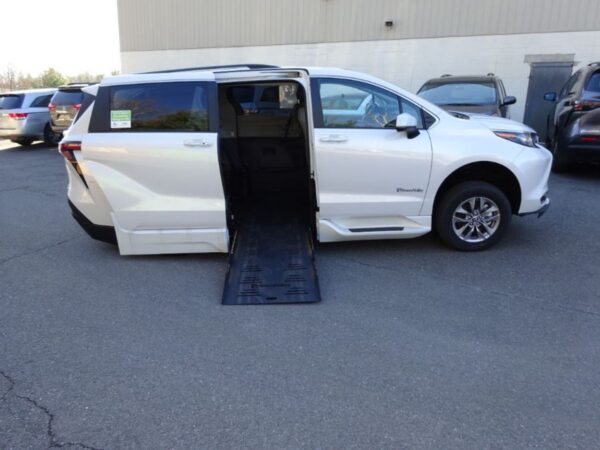 White Toyota Sienna with BraunAbility Side Entry Automatic Fold Out conversion