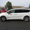 White Chrysler Voyager with Driverge Rear Entry Manual Fold Out conversion