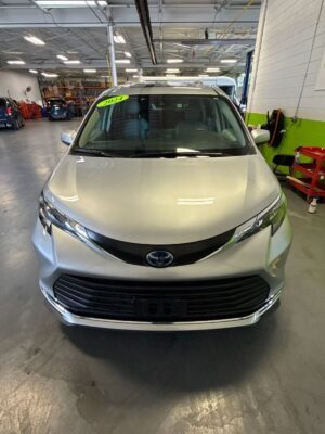 Silver Toyota Sienna with Driverge Rear Entry Manual Fold Out conversion