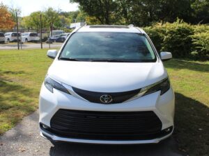 White Toyota Sienna with Driverge Rear Entry Manual Fold Out conversion