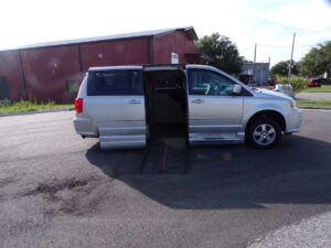 Silver Dodge Grand Caravan with BraunAbility Side Entry Automatic Fold Out conversion