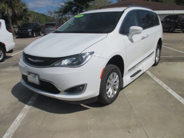 White Chrysler Pacifica with Vantage Mobility Side Entry Automatic In Floor conversion