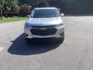 Silver Chevrolet Traverse with BraunAbility Side Entry Automatic In Floor conversion