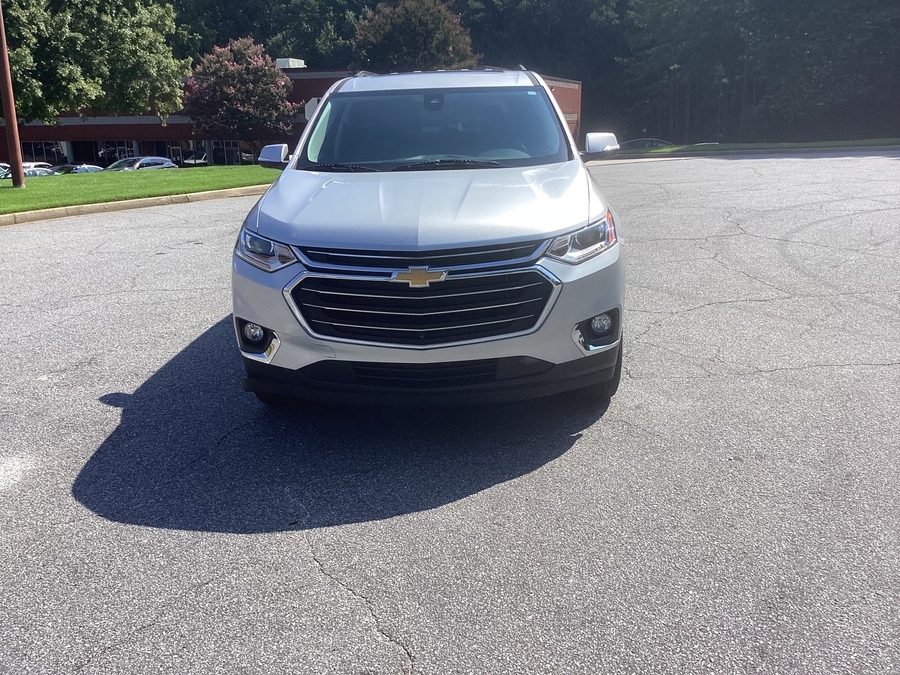 Silver Chevrolet Traverse with BraunAbility Side Entry Automatic In Floor conversion