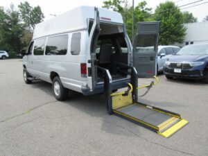 Silver Ford E-Series with Driverge Rear Entry Automatic Fold Out conversion