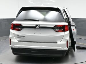 White Honda Odyssey with BraunAbility Side Entry Automatic In Floor conversion