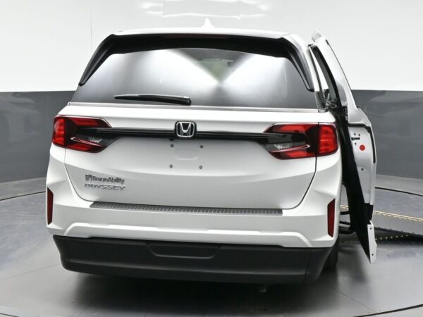White Honda Odyssey with BraunAbility Side Entry Automatic In Floor conversion