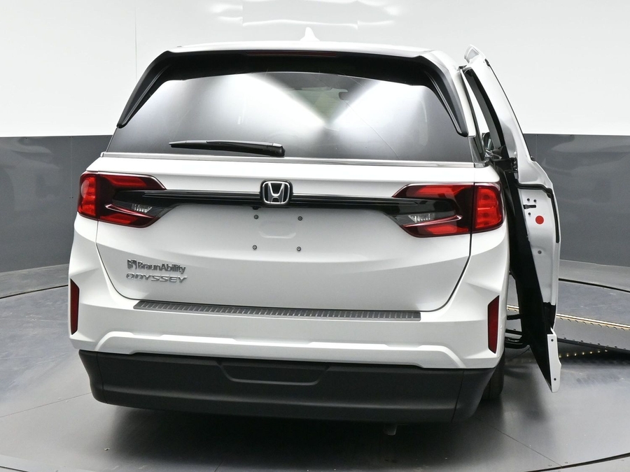 White Honda Odyssey with BraunAbility Side Entry Automatic In Floor conversion