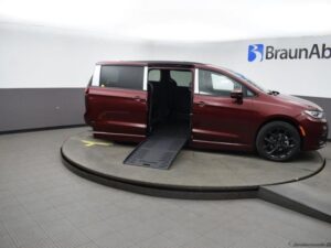 Red Chrysler Pacifica with BraunAbility Side Entry Automatic Fold Out conversion