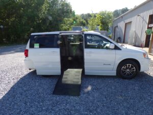 White Dodge Grand Caravan with BraunAbility Side Entry Manual Fold Out conversion