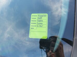 Silver Toyota Sienna with Driverge Rear Entry Manual Fold Out conversion