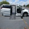 White Chrysler Voyager with BraunAbility Side Entry Automatic Fold Out conversion