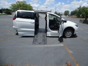 White Chrysler Voyager with BraunAbility Side Entry Automatic Fold Out conversion