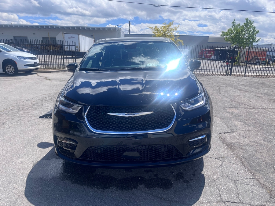 Blue Chrysler Pacifica with Driverge Side Entry Automatic Fold Out conversion