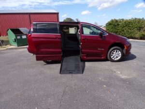 Red Chrysler Voyager with BraunAbility Side Entry Automatic Fold Out conversion