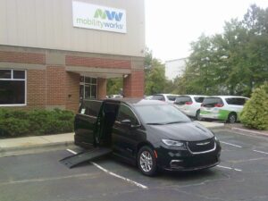 Black Chrysler Pacifica with BraunAbility Side Entry Automatic Fold Out conversion
