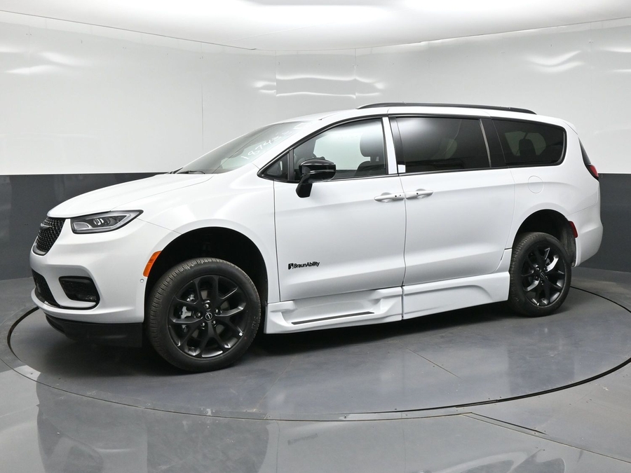 White Chrysler Pacifica with BraunAbility Side Entry Automatic Fold Out conversion
