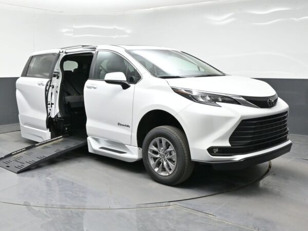White Toyota Sienna with BraunAbility Side Entry Automatic Fold Out conversion