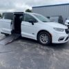 White Chrysler Pacifica with Driverge Side Entry Automatic Fold Out conversion