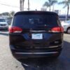 Brown Chrysler Pacifica with BraunAbility Side Entry Automatic Fold Out conversion