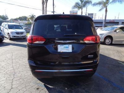 Brown Chrysler Pacifica with BraunAbility Side Entry Automatic Fold Out conversion