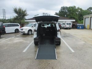 Blue Toyota Sienna with Driverge Rear Entry Manual Fold Out conversion