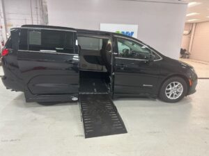 Black Chrysler Voyager with Driverge Side Entry Automatic Fold Out conversion